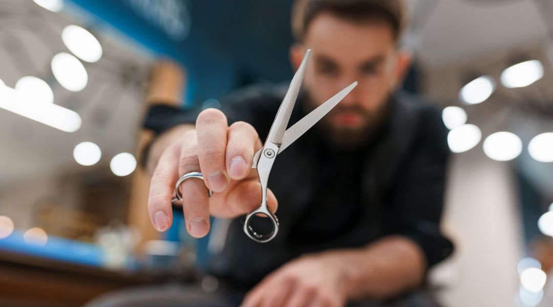 barber with scissors